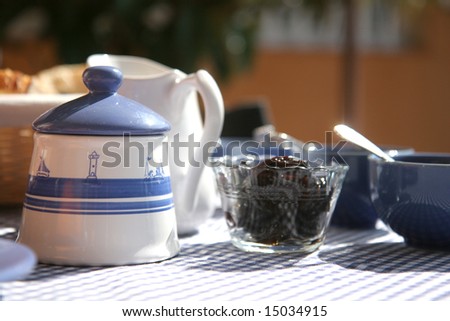 breakfast table on sunny terrace, french Riviera