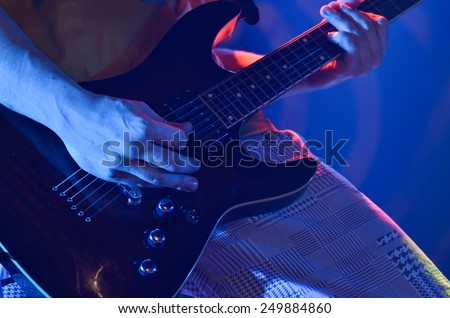 Guitar player with electric guitar
