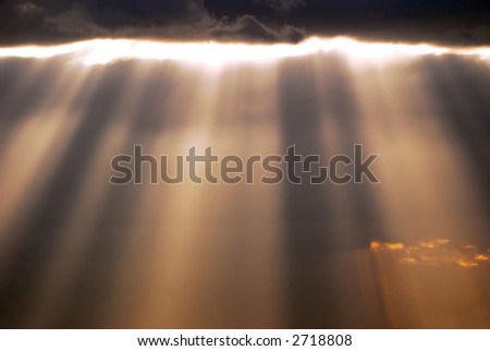 stock-photo-sun-rays-shining-through-the-clouds-2718808.jpg
