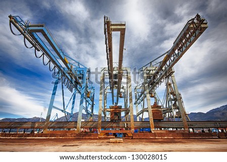 Large harbor cranes Cranes in a seaport Large harbor cranes Cranes in a seaport