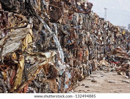 Compacted recyclable waste at a recycling plant