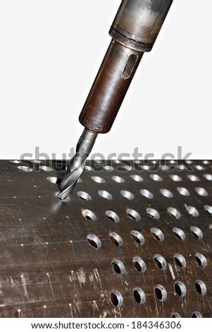 An old industrial electric heavy drill head in a factory for metal drilling, clipping path