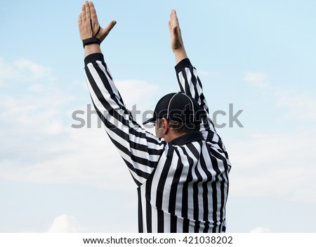 The back of an American football referee, clipping path