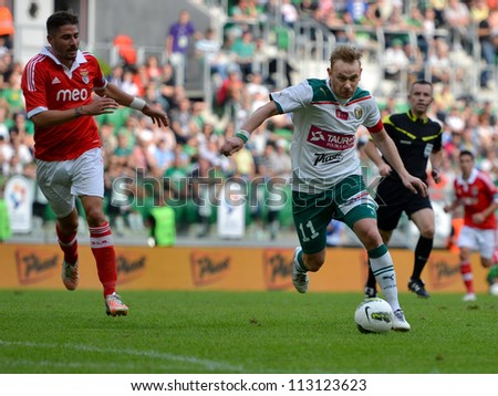 WROCLAW, POLAND - JULY 21: Semifinal Polish Masters tournament   between Slask Wroclaw and Benfica Lisbon 2:4,  Sebastian Mila (11) in action on July 21, 2012 in Wroclaw, Poland.
