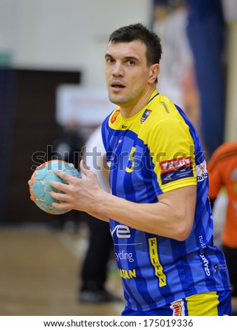 LUBIN, POLAND - FEBRUARY 4, 2014: Michal Jurecki during match PGNiG Superleague Man in handball  between MKS Zaglebie Lubin - KS VIVE Targi Kielce (24:48)