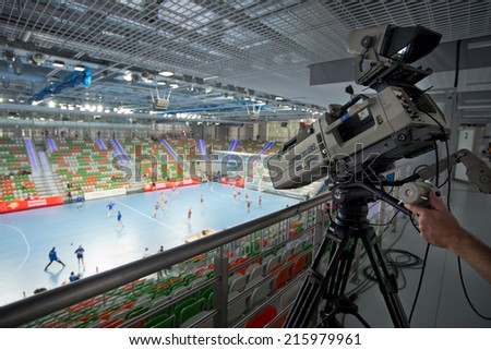 LUBIN, POLAND - SEPTEMBER 7, 2014: TV camera before match PGNiG Superleague Women in handball  between KGHM Metraco Zaglebie Lubin - Pogon Baltica Szczecin (26:22).