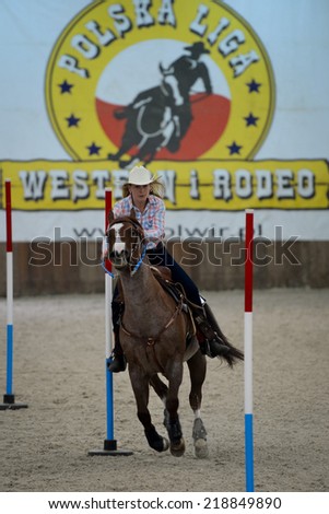 WROCLAW, POLAND - SEPTEMBER 21; 2014:  Unidentified rider during  Polish Championship in Western rides in a Racecourse WTWK Partynice.