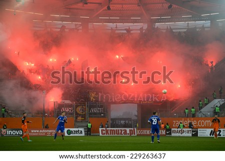 LUBIN, POLAND - NOVEMBER 9, 2014: Fans of Miedz Legnica smoke flares during match Polish 1 League between KGHM Zaglebie Lubin - Miedz Legnica 0:2.