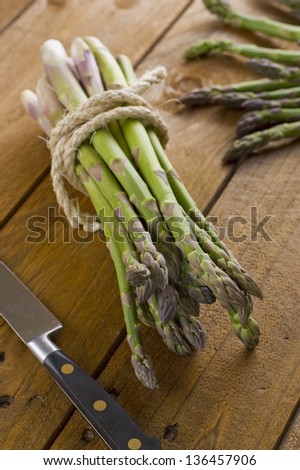 Fresh Asparagus Image of fresh cut seasonal asparagus on a rustic table