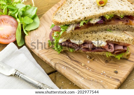 Pastrami on brown sandwich