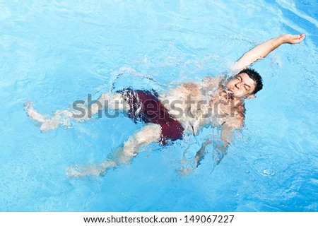 old man in a pool
