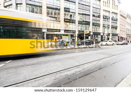 BERLIN, GERMANY - SEPTEMBER 18: typical yellow tram on September 18, 2013 in Berlin, Germany. The tram in Berlin is one of the oldest tram systems in the world.