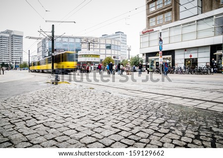 BERLIN, GERMANY - SEPTEMBER 19: typical yellow tram on September 19, 2013 in Berlin, Germany. The tram in Berlin is one of the oldest tram systems in the world.