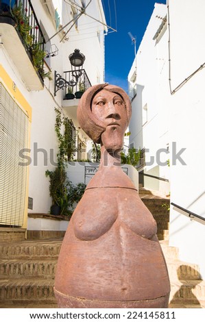 GENALGUACIL, SPAIN - SEPTEMBER 07: View of historic center on September 07, 2014 in Genalguacil, Spain. Artists from all over doing different pieces of art that also leave  exposed in the streets.