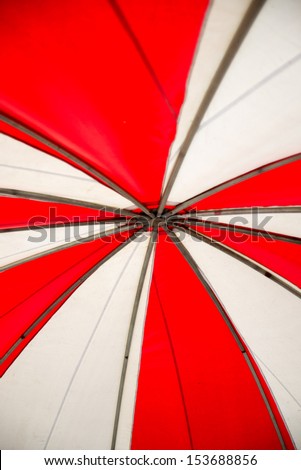 Red and white canvas tents.