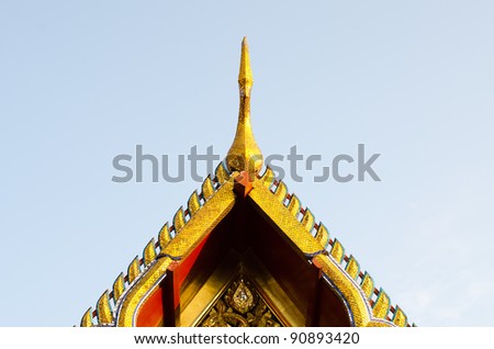 Gable apex in temple roof with, Golden Mount and Wat Saket ,Thailand,