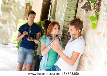 Portrait of happy teens  in the park at summer,Italy
