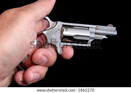 stock-photo-a-magnum-derringer-cradled-in-a-hand-this-is-a-deadly-weapon-shots-of-magnum-ammunition-1862270.jpg