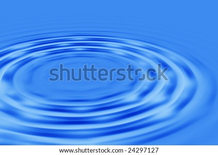 Concentric splash circles in a pool of blue water