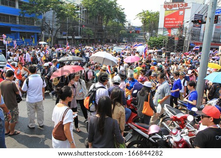 BANGKOK - DECEMBER 9 : Thai protesters join an aiti-government rally to the Government House  on Dec 9, 2013 in Bangkok, Thailand.