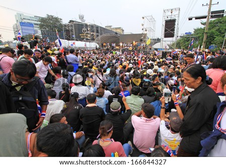 BANGKOK - DECEMBER 9 : Thai protesters join an aiti-government rally to the Government House  on Dec 9, 2013 in Bangkok, Thailand.