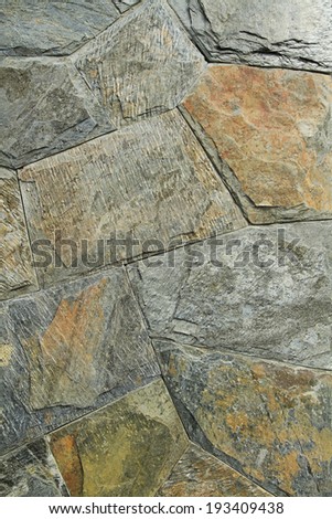 Natural black slate stone tile texture or background
