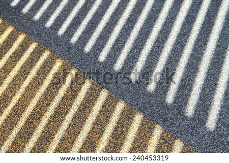 Abstract line pattern from light and shadows on floor
