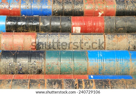 Pile of rusty fuel and chemical drums