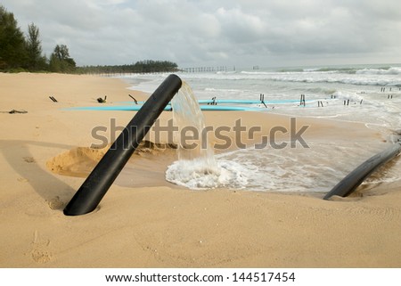 Water pollution from factory onto beach