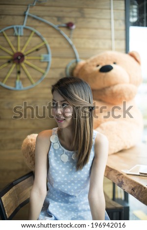 beautiful young girl resting in a cafe