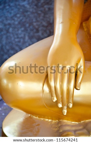 hand of buddha statue in thai temple