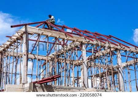 labor working in construction site for roof,blue sky