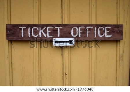 a ticket counter sign