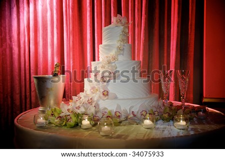 stock photo a wedding cake with a red background