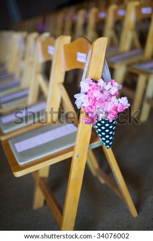 stock photo folding chairs at a modern wedding
