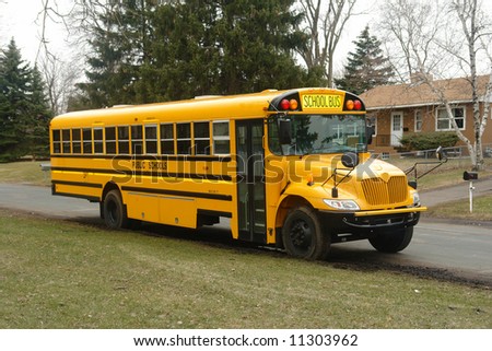 A picture of a school bus awaiting to pick of students