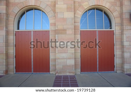 A picture of twin doors with symmetrical design