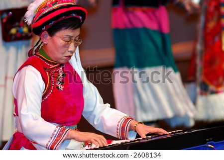 stock-photo-old-lady-perform-on-the-keyboard-2608134.jpg