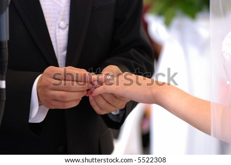 Stock Photo He Put The Wedding Ring On Her Finger