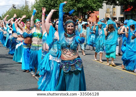 SEATTLE - JUNE 20: A group of belly dancers during the 38th Annual Fremont Solstice Parade on June 20, 2009 in Seattle, WA.  This annual parade encourages artists throughout the community.