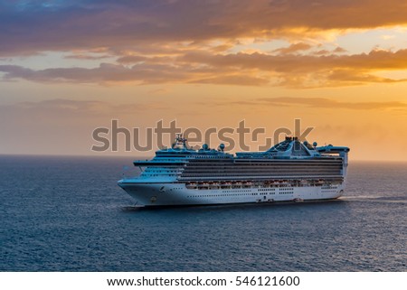 Cruise Ship on the Ocean at Sunset