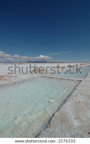 Picture showing a salt lake landscape, called Salinas Grande, near Argentina. This is where salt is exploited. vertical framing