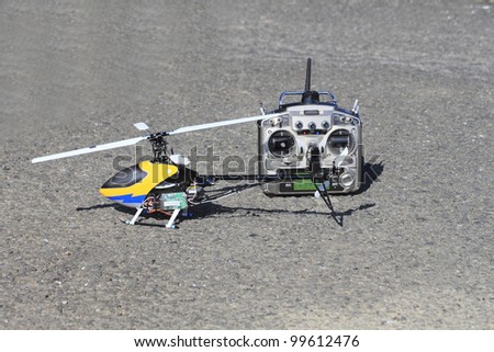 a model helicopter and remote control