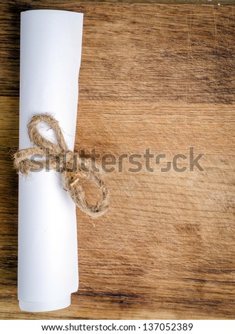 a letter on wooden desk