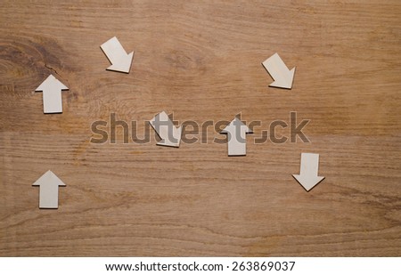 wood  arrow with tag on sack background