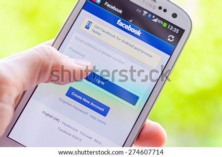 LVIV UKRAINE May 03 2015 White Smart Phone with Facebook Social Network Log In Screen LVIV UKRAINE May 03 2015 White Smart Phone with Facebook Social Network Log In Screen