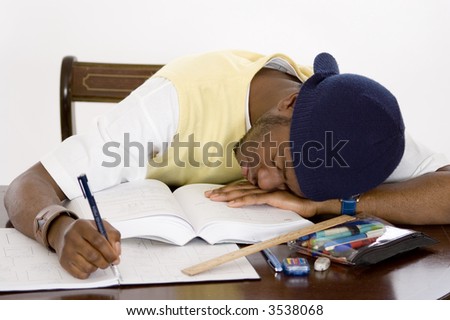 This is an image of a student suffering from academic pressure. This image can be used to represent academic and student themes.