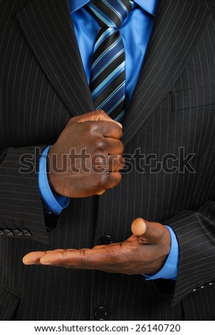 This is an image of a business man about bang his fist into the palm of his hand.