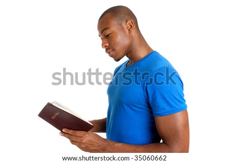 This is an image of young man studying the bible.