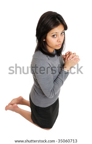 Kneeling In Prayer. kneeling doing prayer